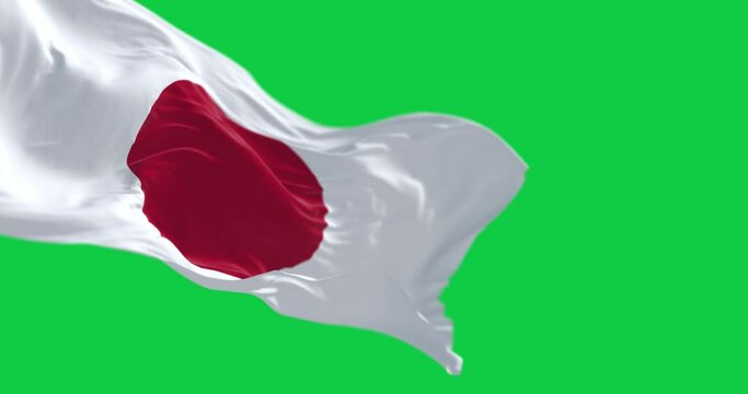 Japan national flag waving isolated on a green background