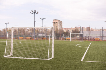 football gate on green sport court.