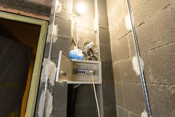 Installing power outlets. Ready to install power sockets on initial stage of construction isolated...