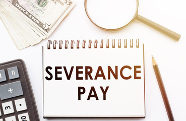Paper with Severance Pay on a table. Business concept - obrazy, fototapety, plakaty