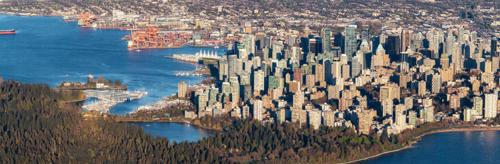 Fototapeta na wymiar Buildings in Urban City on West Coast. Downtown Vancouver, BC, Canada. Aerial View. Panorama.