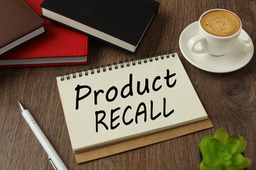 Text Product Recall text on torn paper. on wooden cubes. wooden background. Business concept