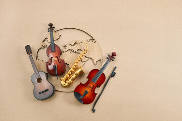 Happy world music day. Musical instruments with globe background.