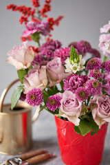 Finished flower arrangement in a vase for home. Flowers bunch, set for interior. Fresh cut flowers for decoration home. European floral shop. Delivery fresh cut flower.