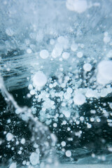 Gas methane bubbles frozen in blue ice of lake Baikal