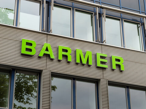 DRESDEN, GERMANY - 16. May 2023: Barmer health insurance logo on a building facade. German provider on the healthcare market. The green letters of the company are on the exterior.