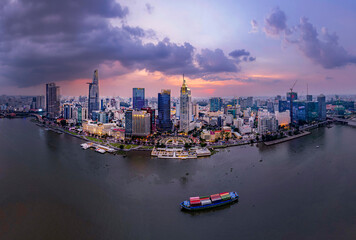 Fototapeta premium Sunset on Saigon riverside, Ho Chi Minh city Vietnam. Photo taken on May 2023