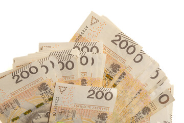 A large stack of Polish 200 zloty banknotes on a white background.  Synonymous with wealth and...