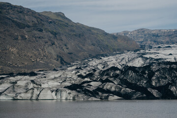 Skaftafell glacier landscape in Svinafell, Iceland. Background of green mountains