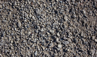 Pebbles, small stones.Crushed stones.Building material close-up.