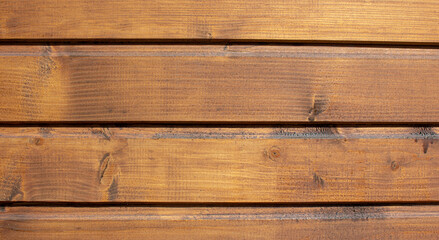 Texture of the boards. Boards painted in orange. Wood texture, background.