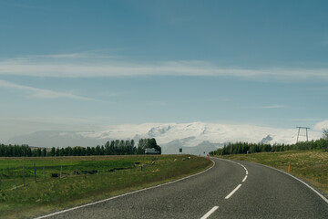 Fototapeta na wymiar road through green mountains in iceland