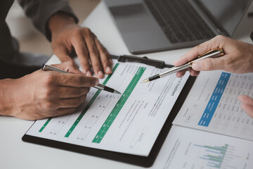 Executives and managers are meeting in a conference room, on the table there are some documents about the company's finances, managers are discussing financial information with the management.