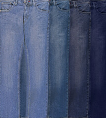 Denim background. Shades of blue denim.
