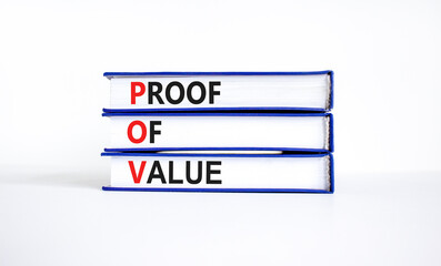 POV Proof of value symbol. Concept words POV Proof of value on beautiful books. Beautiful white table white background. Business and POV Proof of value concept. Copy space.