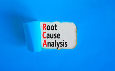 RCA root cause analysis symbol. Concept words RCA root cause analysis on beautiful white paper. Beautiful blue table blue background. Business and RCA root cause analysis concept. Copy space.