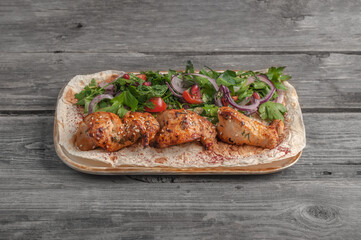 meat barbecue shashlik on gray wooden background