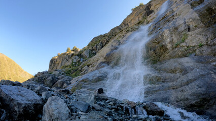 nice mountain high land fast water cascade at summer day - photo of nature