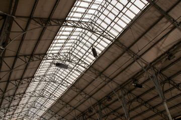 Glass ceiling of Rossio Train Station, historic building built in 19th century at Praca dos Restauradores (Restauradores Square)