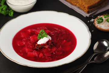 A plate with Ukrainian national dish - borsch