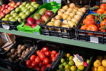 Organic fruit on display, stand with vegetables and fruits in front of the store, Lisbon, Portugal