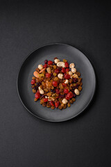 Mix of roasted cashews, hazelnuts and walnuts with dried cranberries and raisins