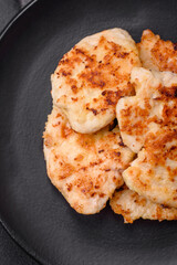 Delicious fried chicken meat chops with spices, salt and herbs