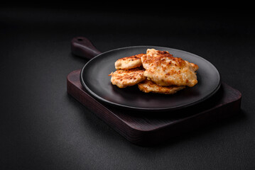 Delicious fried chicken meat chops with spices, salt and herbs