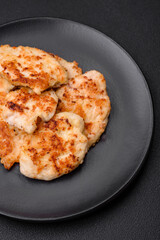 Delicious fried chicken meat chops with spices, salt and herbs