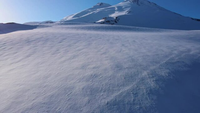 Aerial view of the two-headed Elbrus peak at dawn