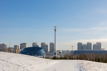 Modern residential buildings on sunny winter day, Nur-Sultan, Astana, Kazakhstan. High quality photo