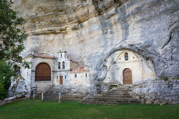 Fototapeta na wymiar San Tirso and San Bernabé Hermitage carved into the limestone within Ojo Guareña, province of Burgos, Castile and León, Spain