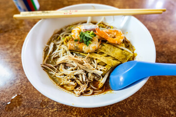 Sarawak Laksa, a spicy noodle dish famous and unique to the state of Sarawak in Malaysia
