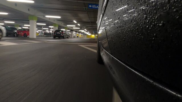Car driving at the garage parking lot
