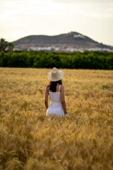 Portrait of a girl in a cereal field