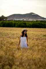 Portrait of a girl in a cereal field