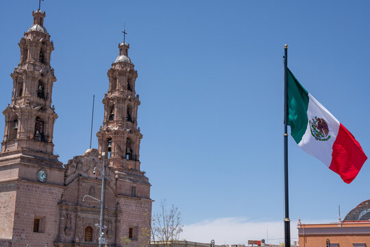 Aguascalientes Cathedral and the Mexican flag