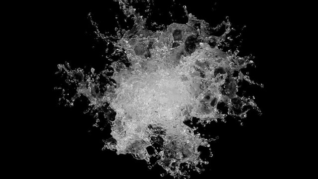 Super slow motion of splashing water on black background. Filmed on high speed cinema camera, 1000fps. Top view shot.