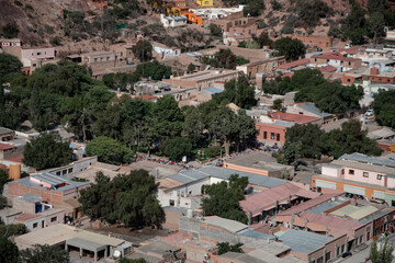 Aerial view of sector of village in Purmamarca, northern Argentina. Fill in the frame. No people. Daytime.