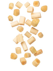 Sugar cane cut chop flying explosion, yellow chop sugarcane abstract cloud fly. Sugar sugarcane cut cubes splash stop in air, food object design. white background isolated high speed freeze motion