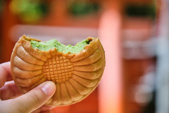Monaka matcha ice cream at Fushimi Inari Taisha, Kyoto, Japan. Japanese Sweet.