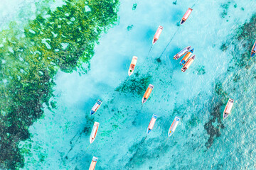 Aerial view of anchored boats in the exotic blue lagoon, Zanzibar, Tanzania