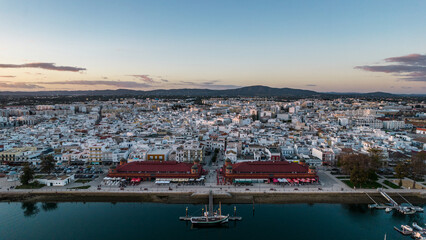 Aerial drone view of Olhao, officially known as Olhao da Restauracao, a city and municipality in the Algarve region, southern Portugal