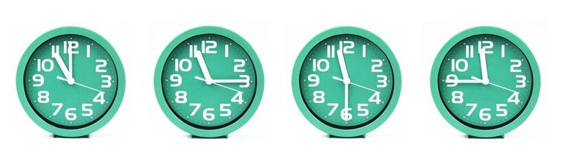 close up of a set of green clocks showing the time; 11, 11.15, 11.30 and 11.45 p.m or a.m. Isolated on white background
 - obrazy, fototapety, plakaty