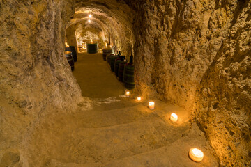 Interior of old wine cellar lit by candles, Vrbice, Breclav District, Moravia