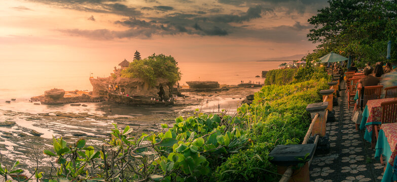View of Tanah Lot, traditional Balinese temple at sunset, Beraban, Kediri, Tabanan Regency, Bali