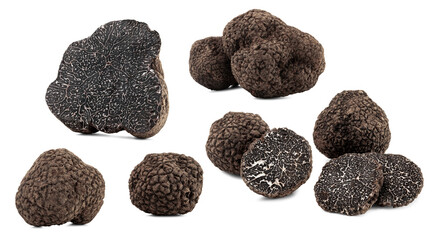 set of black truffles with slices on white background.