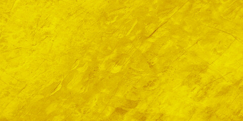 Grunge classic golden yellow concrete background. Textured plaster wall.