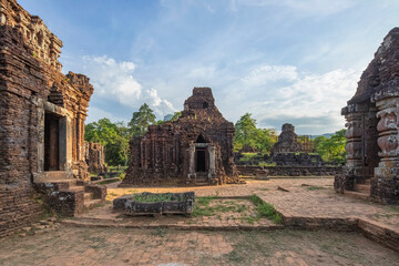 Fototapeta na wymiar MY SON SANCTUARY IS A LARGE COMPLEX OF RELIGIOUS RELICS COMPRISES CHAM ARCHITECTURAL WORKS. A UNESCO WORLD HERITAGE SITE IN QUANG NAM, VIETNAM. LOCATED ABOUT 30 KM WEST OF HOI AN ANCIENT TOWN.