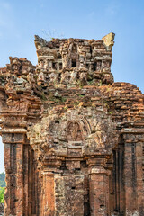 Naklejka premium MY SON SANCTUARY IS A LARGE COMPLEX OF RELIGIOUS RELICS COMPRISES CHAM ARCHITECTURAL WORKS. A UNESCO WORLD HERITAGE SITE IN QUANG NAM, VIETNAM. LOCATED ABOUT 30 KM WEST OF HOI AN ANCIENT TOWN.